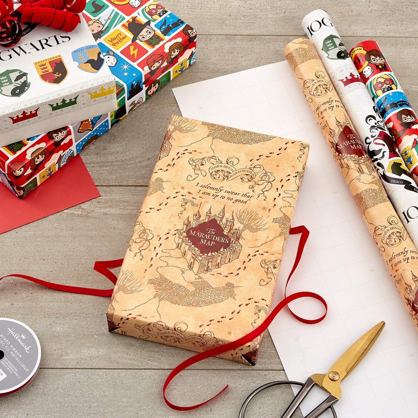 Hallmark Harry Potter Wrapping Paper with Cut Lines on Reverse (3-Pack: 60 sq. ft. ttl; Marauder's Map, Hogwarts Crest) for Birthdays, Graduations, Christmas, Valentine's Day, Kids, Fans