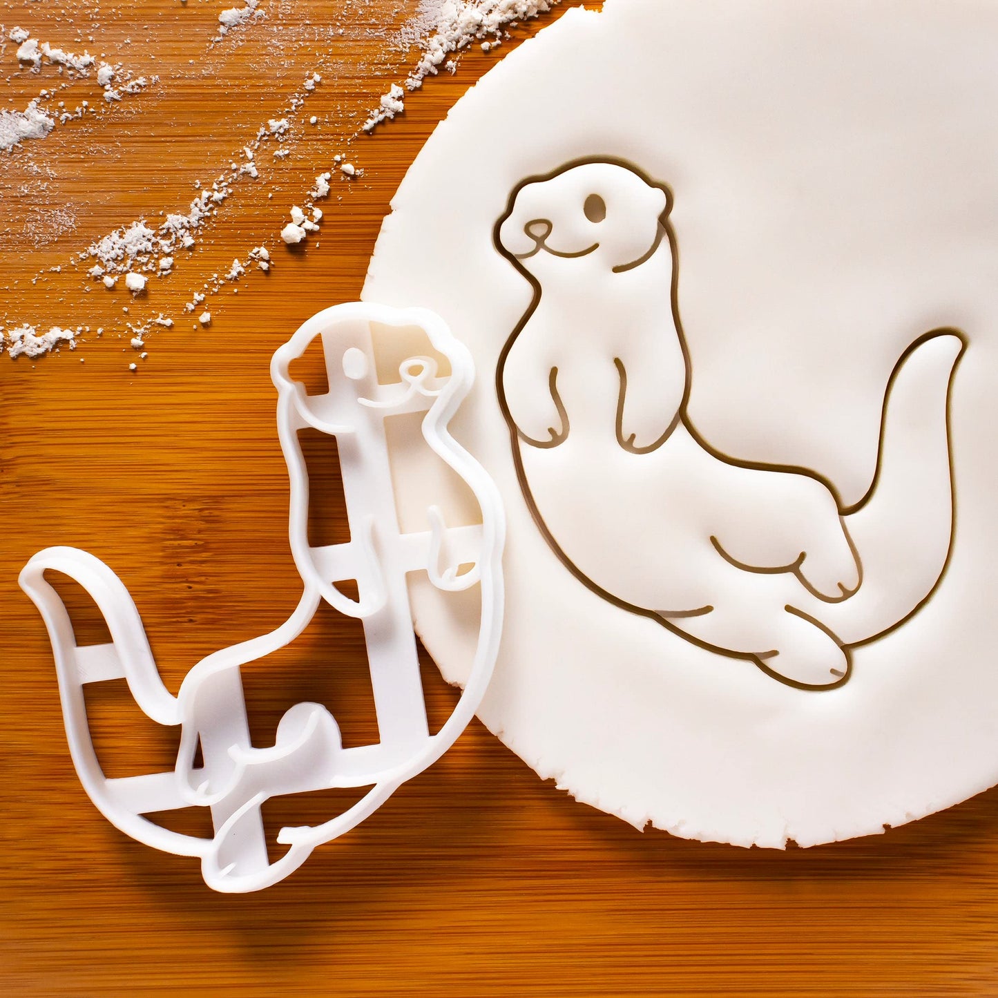 Set of 2 Otter cookie cutters (Design: Swimming Sea Otter and Otter Holding Hands), 2 pieces - Bakerlogy