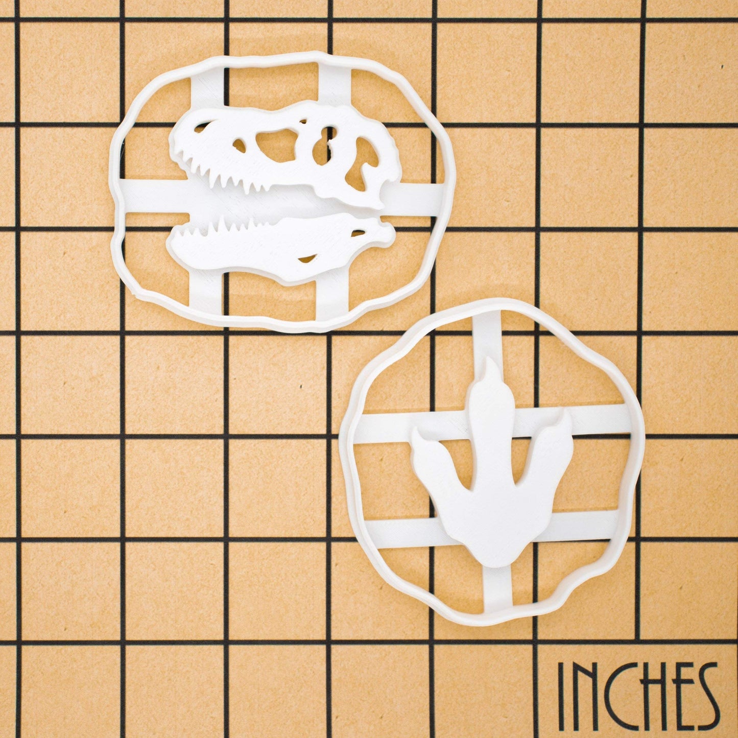 Set of 2 T-Rex Footprint and Skull Fossil cookie cutter, 2 pieces - Bakerlogy